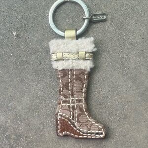 ‼️SOLD DON’T BUY‼️
COACH VINTAGE SIGNATURE BOOT WITH THE FUR CHARM